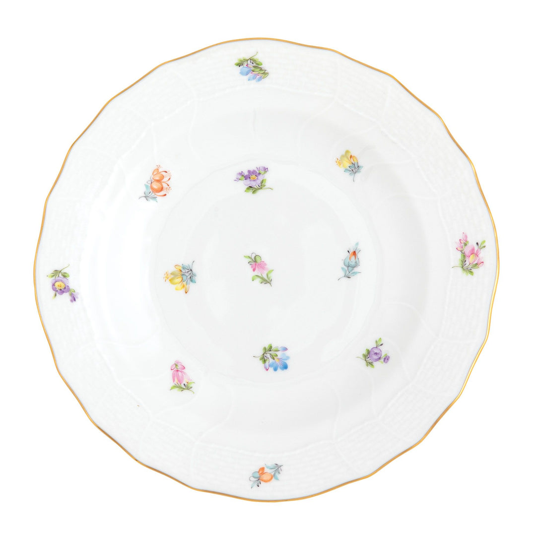 Decorative plate with small floral patterns on a white background by Herend